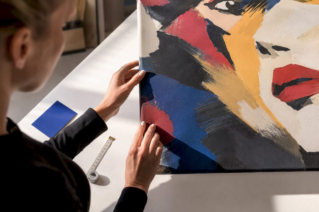 Buyer inspecting cropped pop art canvas