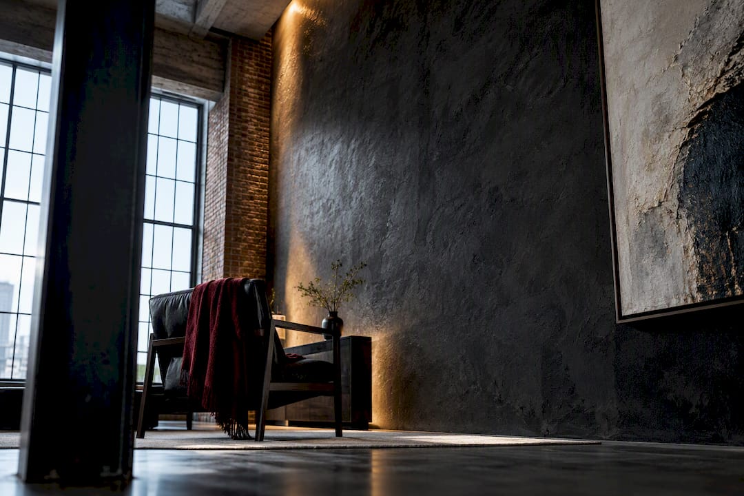 Textured oversized art wall in an industrial loft