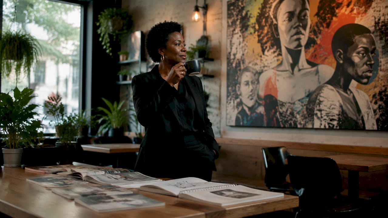 Executive observing office art reflecting culture