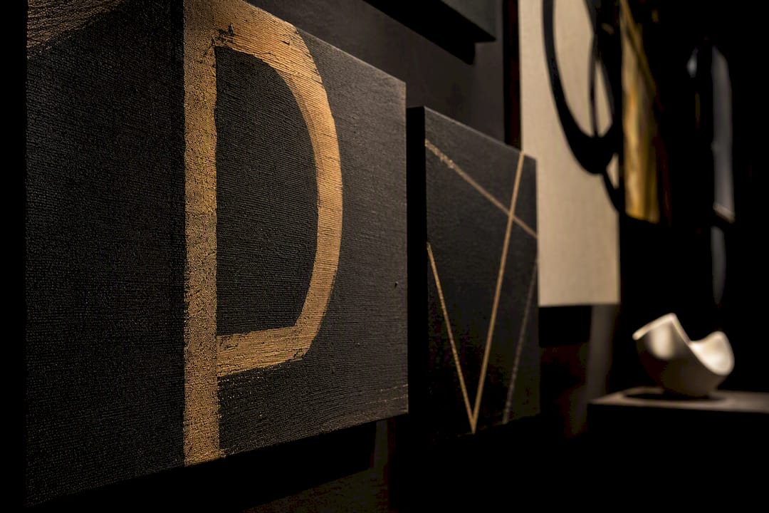 Cropped fashion-inspired canvas art installation