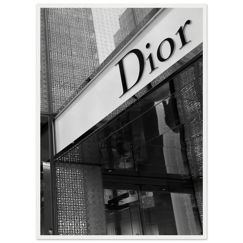 Dior Facade Wall Art: Black and white photo of a Dior store's modern facade, featuring the iconic logo and geometric design details.